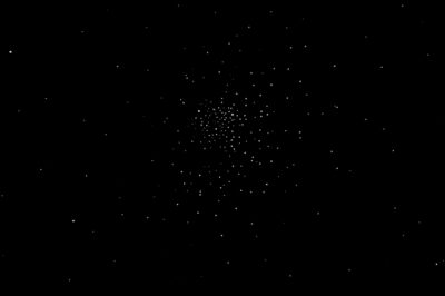 a globular star cluster, outer space